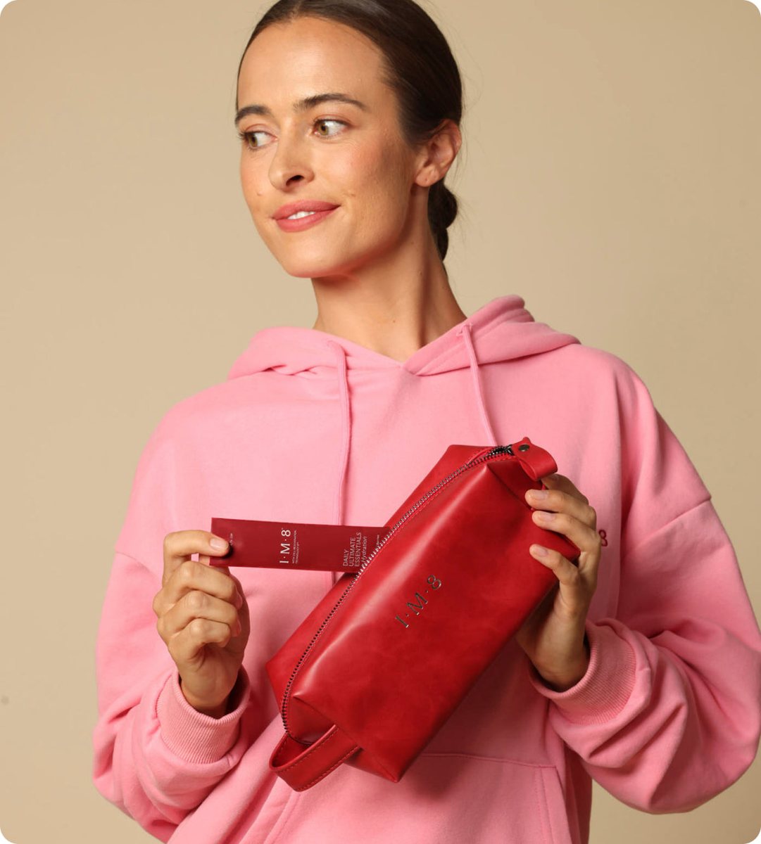 IM8 travel pouch with a Daily Ultimate Essentials sachet